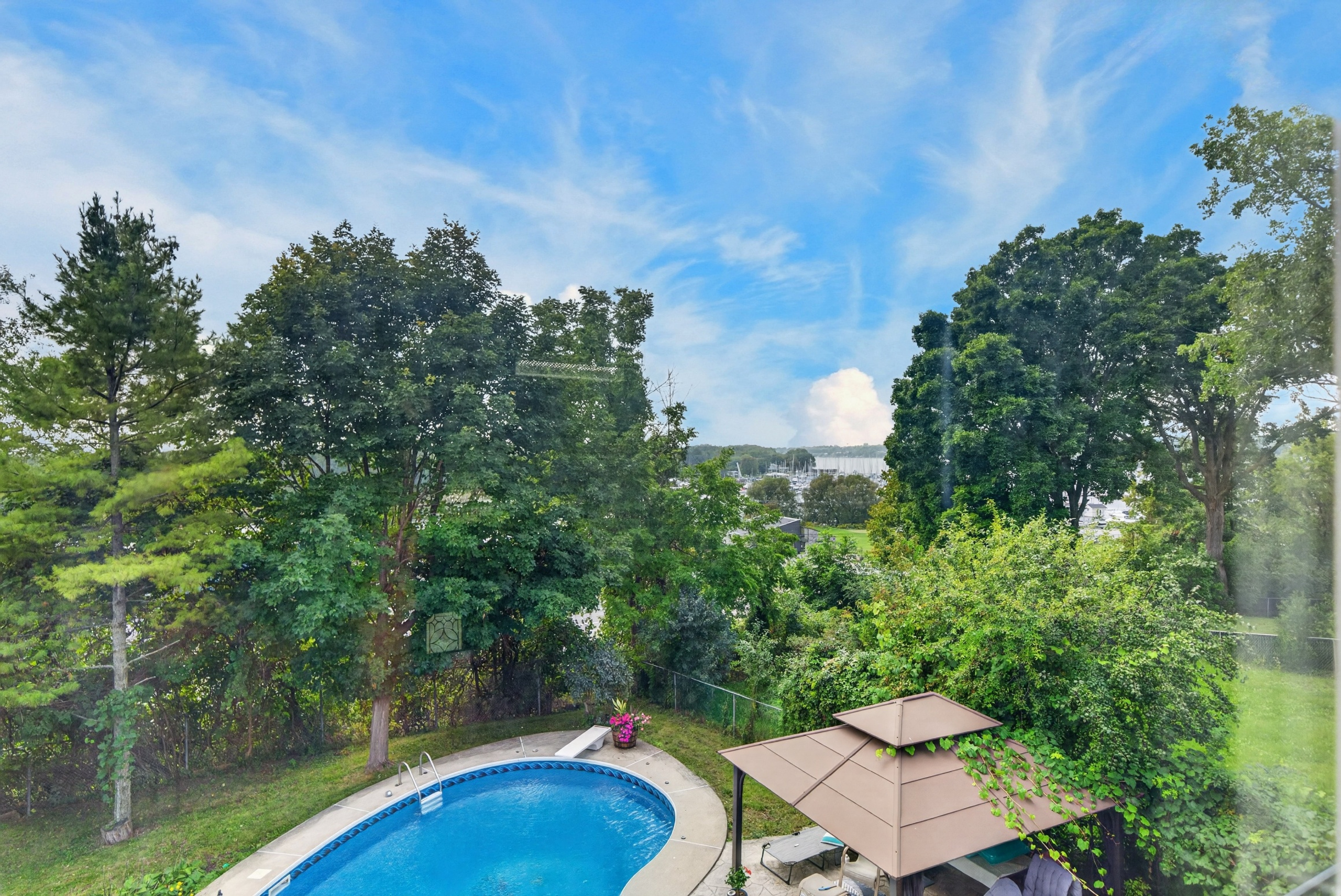 Private mature trees surrounding 601 Forest Hill Drive