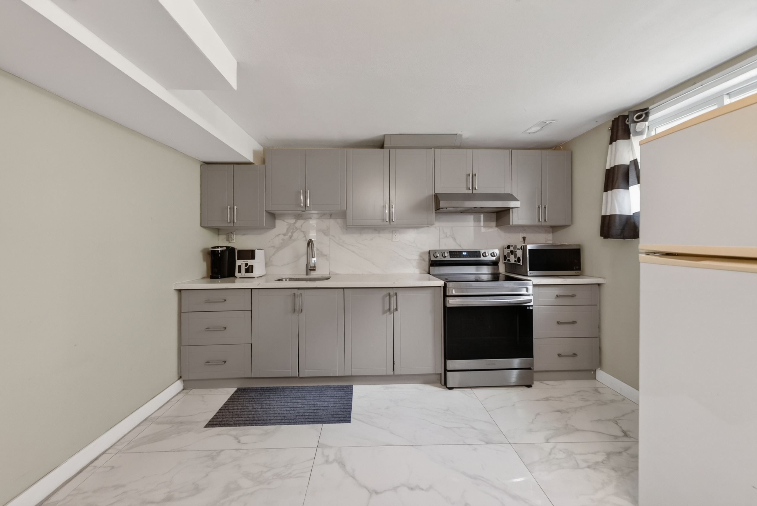 Lower-level kitchen at 601 Forest Hill Drive